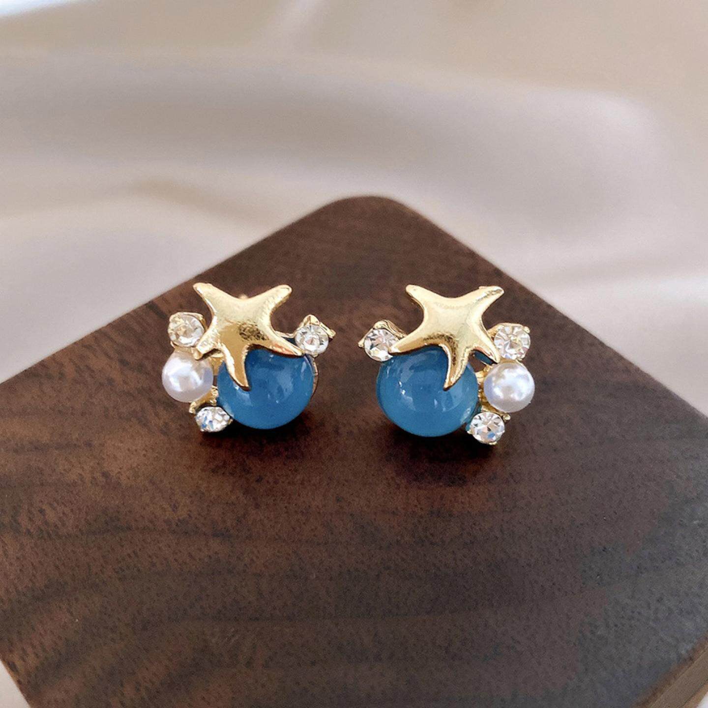 Ocean Vibes-örhängen med sjöstjärnor – örhängen med blå cabochoner och pärlor